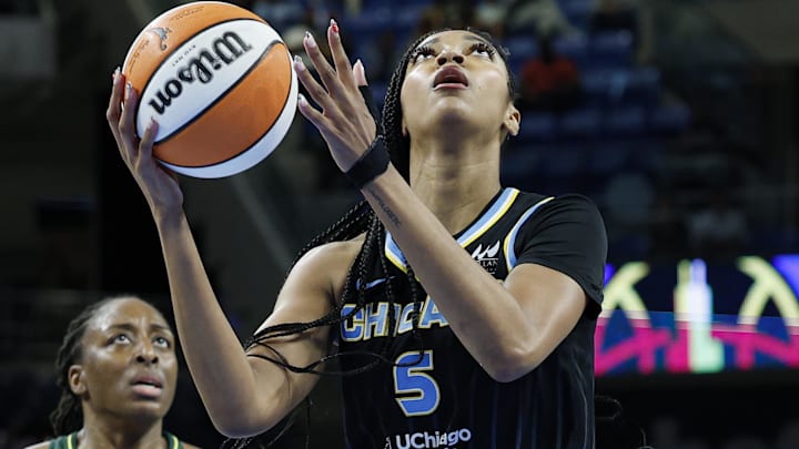 Aug 19, 2025; Chicago, Illinois, USA; Chicago Sky forward Angel Reese (5) drives to the basket against the Seattle Storm during the first half at Wintrust Arena. Mandatory Credit: Kamil Krzaczynski-Imagn Images