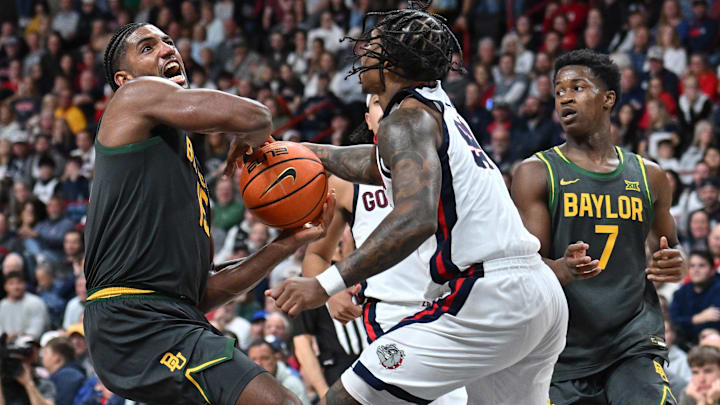 Baylor Bears forward Norchad Omier (15) is fouled by Gonzaga Bulldogs guard Khalif Battle (99) in the second half of the Zags' 101-63 win on Monday night.