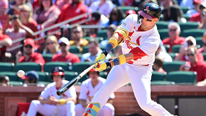 Sep 7, 2025; St. Louis, Missouri, USA; St. Louis Cardinals outfielder Lars Nootbaar (21) singles in the fifth inning for an RBI against the San Francisco Giants at Busch Stadium. Mandatory Credit: Tim Vizer-Imagn Images