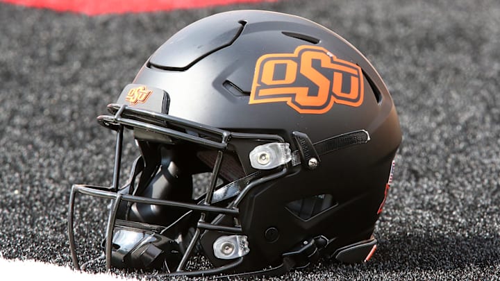 Oct 25, 2025; Lubbock, Texas, USA;  A general view of an Oklahoma State Cowboys helmet on the field before the game against the Texas Tech Red Raiders at Jones AT&T Stadium. Mandatory Credit: Michael C. Johnson-Imagn Images