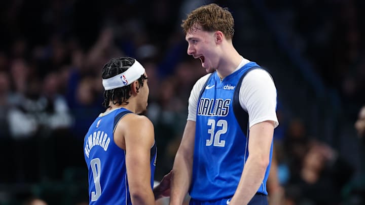 Dec 3, 2025; Dallas, Texas, USA;  Dallas Mavericks forward Cooper Flagg (32) celebrates with Dallas Mavericks guard Ryan Nembhard (9) after scoring during the fourth quarter against the Miami Heat at American Airlines Center. Mandatory Credit: Kevin Jairaj-Imagn Images