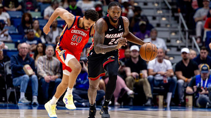 Apr 11, 2025; New Orleans, Louisiana, USA; Miami Heat forward Haywood Highsmith (24) brings the ball up court against New Orleans Pelicans forward Jeremiah Robinson-Earl (50) during the first half at Smoothie King Center. Mandatory Credit: Stephen Lew-Imagn Images Apr 11, 2025; New Orleans, Louisiana, USA; Miami Heat forward Haywood Highsmith (24) brings the ball up court against New Orleans Pelicans forward Jeremiah Robinson-Earl (50) during the first half at Smoothie King Center. Mandatory Credit: Stephen Lew-Imagn Images