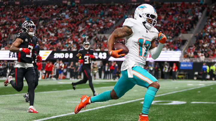 Miami Dolphins wide receiver Jaylen Waddle (17) scores a touchdown against the Atlanta Falcons in the third quarter at Mercedes-Benz Stadium.