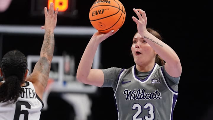 Kansas State Wildcats guard Jordan Speiser (23) shoots for three against Oklahoma State Cowgirls during the quarterfinal round of the Big 12 Tournament inside T-Mobile Center in Kansas City, Missouri, on Friday, March 6, 2026.