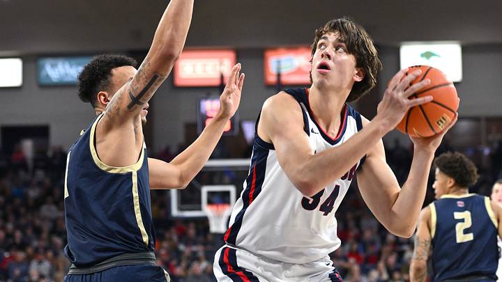 Nov 14, 2023; Spokane, Washington, USA; Gonzaga Bulldogs forward Braden Huff (34) shoots the ball against Eastern Oregon Mountaineers forward Brennen Newsom (1) in the second half at McCarthey Athletic Center. Nov 14, 2023; Spokane, Washington, USA; Gonzaga Bulldogs forward Braden Huff (34) shoots the ball against Eastern Oregon Mountaineers forward Brennen Newsom (1) in the second half at McCarthey Athletic Center.