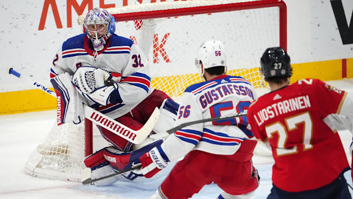 Dec 29, 2023; Sunrise, Florida, USA; New York Rangers goaltender Jonathan Quick (32) blocks the shot