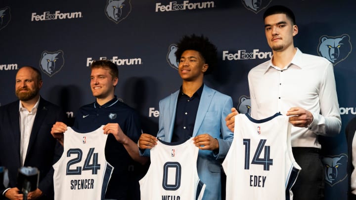 2024 NBA Draft picks Cam Spencer, Jaylen Wells, and Zach Edey hold up their jerseys 2024 NBA Draft picks Cam Spencer, Jaylen Wells, and Zach Edey hold up their jerseys