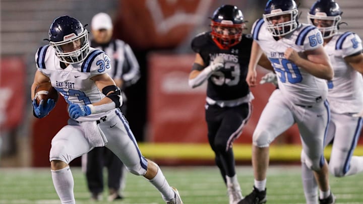 Bay Port High School's Brady Moon (33) runs the ball against Muskego High School during the WIAA Division 1 state championship game on Friday, November 22, 2024, at Camp Randall Stadium in Madison, Wis. Bay Port won the game, 25-18.
Tork Mason/USA TODAY NETWORK-Wisconsin