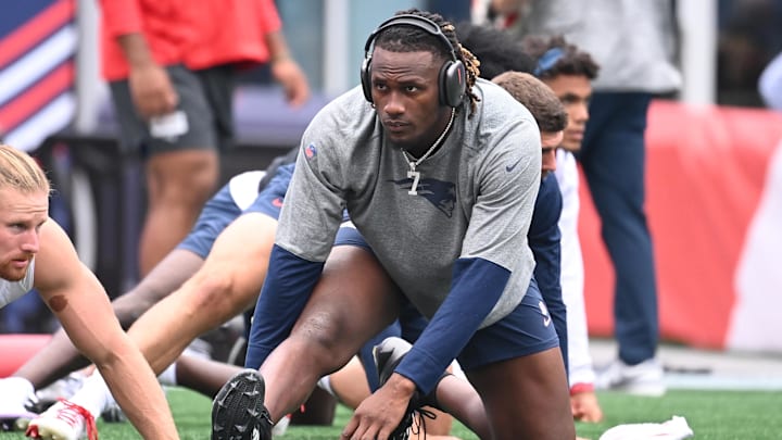 New England Patriots quarterback Joe Milton III warms up before a game against the Carolina Panthers at Gillette Stadium.