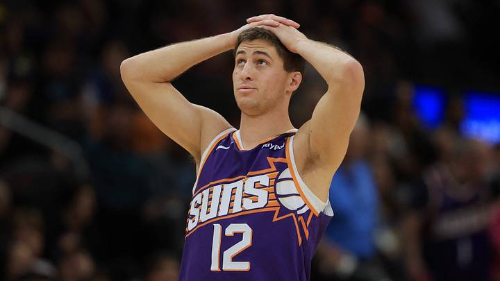 Phoenix Suns guard Collin Gillespie (12) reacts against the Golden State Warriors during the first half at Footprint Center on April 8, 2025.