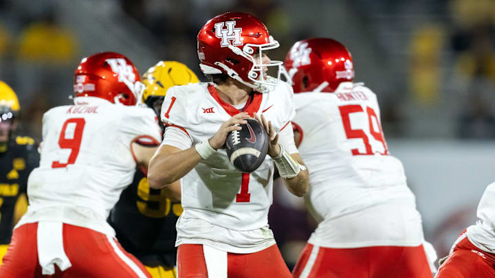 Oct 25, 2025; Tempe, Arizona, USA; Houston Cougars quarterback Conner Weigman (1) against the Arizona State Sun Devils in the second half at Mountain America Stadium. Oct 25, 2025; Tempe, Arizona, USA; Houston Cougars quarterback Conner Weigman (1) against the Arizona State Sun Devils in the second half at Mountain America Stadium.