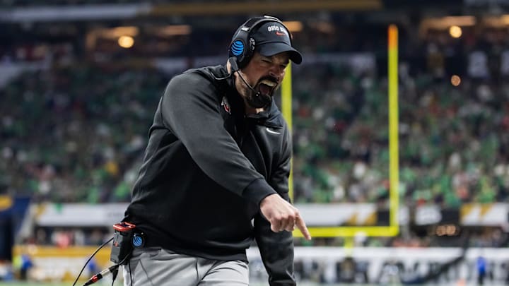 Jan 20, 2025; Atlanta, GA, USA; Ohio State Buckeyes head coach Ryan Day reacts as he celebrates a play against the Notre Dame Fighting Irish during the CFP National Championship college football game at Mercedes-Benz Stadium.