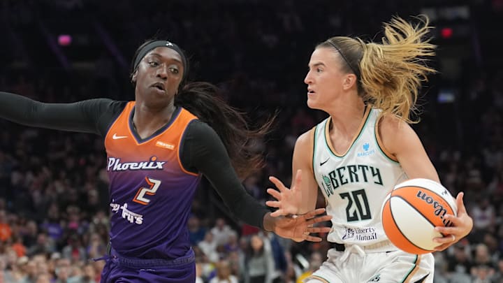 Jun 27, 2025; Phoenix, Arizona, USA; Phoenix Mercury guard Kahleah Copper (2) guards New York Liberty guard Sabrina Ionescu (20) during the second half at Footprint Center. Mandatory Credit: Joe Camporeale-Imagn Images