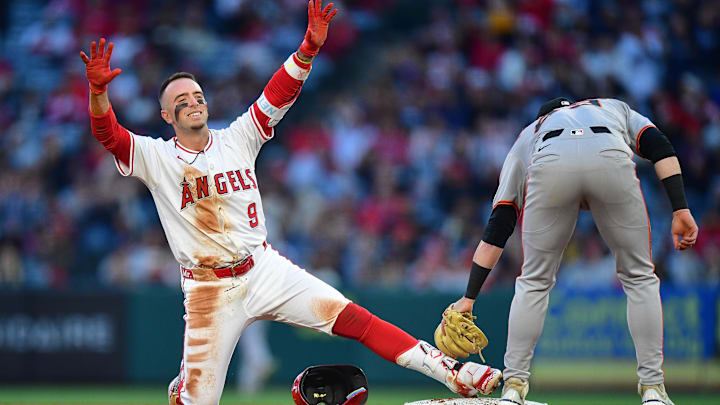 Apr 18, 2025; Anaheim, California, USA; Los Angeles Angels shortstop Zach Neto (9) reaches second on an RBI double against the San Francisco Giants during the second inning at Angel Stadium. Mandatory Credit: Gary A. Vasquez-Imagn Images