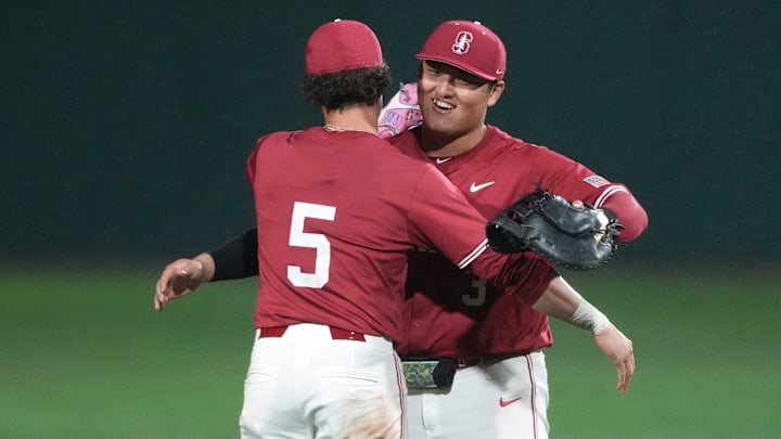 Mar 1, 2025; Stanford, CA, USA; Stanford Cardinal first baseman Rintaro Sasaki (right) and third baseman Trevor Haskins (5) celebrate after defeating the Xavier Musketeers at Sunken Diamond. Mandatory Credit: Darren Yamashita-Imagn Images