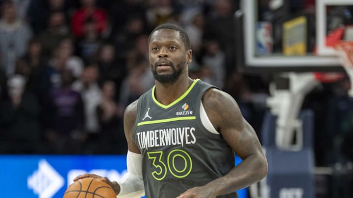 Jan 15, 2025; Minneapolis, Minnesota, USA; Minnesota Timberwolves forward Julius Randle (30) dribbles the ball against the Golden State Warriors at Target Center. Mandatory Credit: Jesse Johnson-Imagn Images