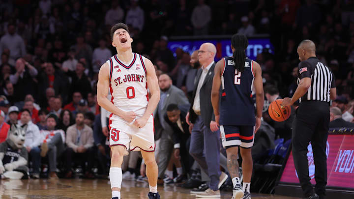 Mar 14, 2026; New York, NY, USA; St. John's basketball guard Dylan Darling (0) reacts in the closing minutes during the second half against the Connecticut Huskies of the men's Big East Conference Tournament Championship at Madison Square Garden.