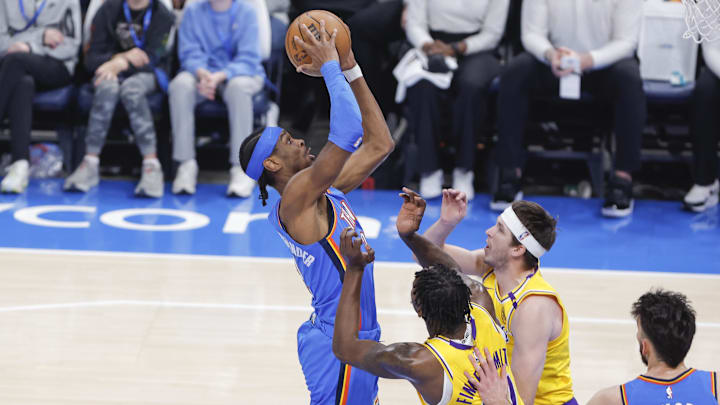 Apr 8, 2025; Oklahoma City, Oklahoma, USA; Oklahoma City Thunder guard Shai Gilgeous-Alexander (2) shoots against the Los Angeles Lakers during the first quarter at Paycom Center. Mandatory Credit: Alonzo Adams-Imagn Images