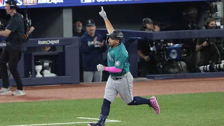 Oct 19, 2025; Toronto, Ontario, CAN; Seattle Mariners first baseman Josh Naylor (12) runs after hitting a solo home run against the Toronto Blue Jays in the sixth inning during game six of the ALCS round for the 2025 MLB playoffs at Rogers Centre. Mandatory Credit: Kevin Sousa-Imagn Images