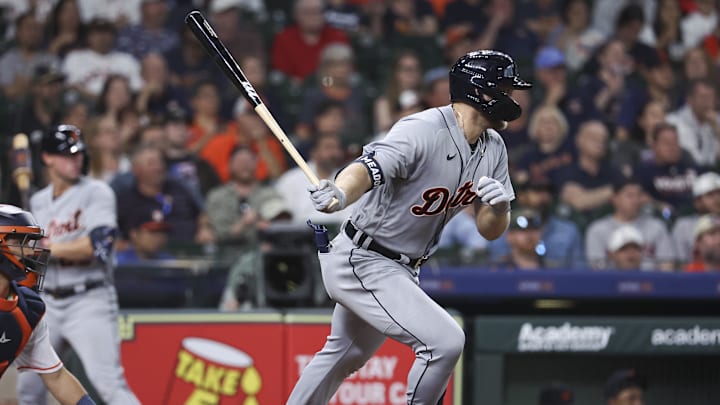 Apr 5, 2023; Houston, Texas, USA; Detroit Tigers left fielder Austin Meadows (17) hits an RBI single during the eighth inning against the Houston Astros at Minute Maid Park. 