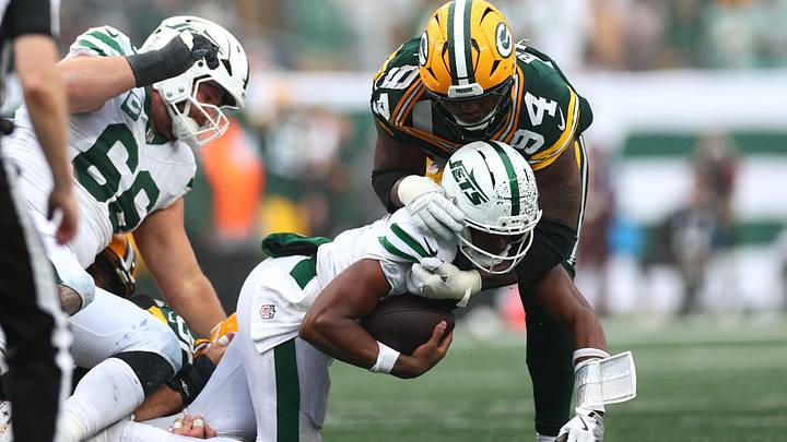 Sep 20, 2026; East Rutherford, New Jersey, USA; Green Bay Packers defensive tackle Karl Brooks (94) sacks New York Jets quarterback Geno Smith (7) in overtime at MetLife Stadium. Mandatory Credit: Vincent Carchietta-Imagn Images Sep 20, 2026; East Rutherford, New Jersey, USA; Green Bay Packers defensive tackle Karl Brooks (94) sacks New York Jets quarterback Geno Smith (7) in overtime at MetLife Stadium. Mandatory Credit: Vincent Carchietta-Imagn Images
