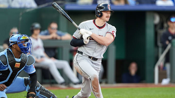 Mar 27, 2025; Kansas City, Missouri, USA; Cleveland Guardians designated hitter Kyle Manzardo (9) hits an RBI double against the Kansas City Royals during the tenth inning at Kauffman Stadium. Mandatory Credit: Jay Biggerstaff-Imagn Images Mar 27, 2025; Kansas City, Missouri, USA; Cleveland Guardians designated hitter Kyle Manzardo (9) hits an RBI double against the Kansas City Royals during the tenth inning at Kauffman Stadium. Mandatory Credit: Jay Biggerstaff-Imagn Images