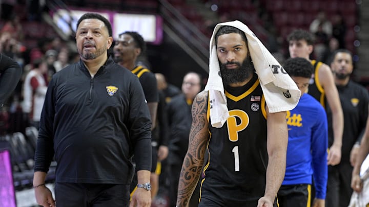 Jan 15, 2025; Tallahassee, Florida, USA; Pittsburgh Panthers head coach Jeff Capel and guard Damian Dunn (1) walk off the court after the loss to the Florida State Seminoles at Donald L. Tucker Center. Mandatory Credit: Melina Myers-Imagn Images