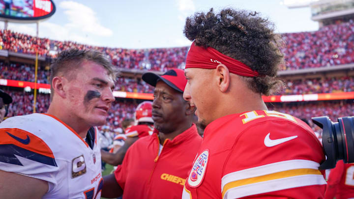 Nov 10, 2024; Kansas City, Missouri, USA; Kansas City Chiefs quarterback Patrick Mahomes (15) greets Denver Broncos quarterback Bo Nix (10) after the game at GEHA Field at Arrowhead Stadium. Mandatory Credit: Denny Medley-Imagn Images