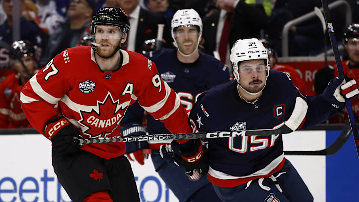 Feb 20, 2025; Boston, MA, USA; [Imagn Images direct customers only] Team Canada forward Connor McDavid (97) and United States forward Auston Matthews (34) during the 4 Nations Face-Off ice hockey championship game at TD Garden. Mandatory Credit: Winslow Townson-Imagn Images