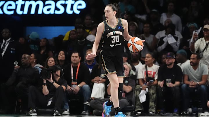 Sep 29, 2024; Brooklyn, New York, USA; New York Liberty forward Breanna Stewart (30) dribbles the ball up the court against the Las Vegas Aces during game one of the 2024 WNBA Semi-finals at Barclays Center. 