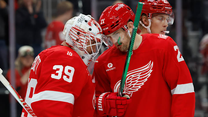 Oct 15, 2025; Detroit, Michigan, USA; Detroit Red Wings goaltender Cam Talbot (39) and left wing James van Riemsdyk (21) celebrate after defeating the Florida Panthers at Little Caesars Arena. Mandatory Credit: Rick Osentoski-Imagn Images Oct 15, 2025; Detroit, Michigan, USA; Detroit Red Wings goaltender Cam Talbot (39) and left wing James van Riemsdyk (21) celebrate after defeating the Florida Panthers at Little Caesars Arena. Mandatory Credit: Rick Osentoski-Imagn Images