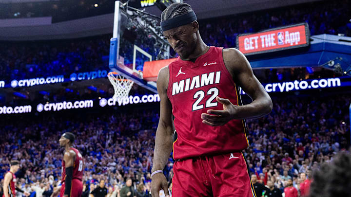 Apr 17, 2024; Philadelphia, Pennsylvania, USA; Miami Heat forward Jimmy Butler (22) reacts after a collision during the fourth quarter against the Philadelphia 76ers in a play-in game of the 2024 NBA playoffs at Wells Fargo Center. Mandatory Credit: Bill Streicher-Imagn Images