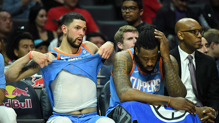 Mar 18, 2018; Los Angeles, CA, USA; LA Clippers guard Austin Rivers (25) and center DeAndre Jordan (6) react in the fourth quarter against the Portland Trail Blazers at Staples Center. The Trail Blazers defeated the Clippers 122-109. Mandatory Credit: Kirby Lee-Imagn Images