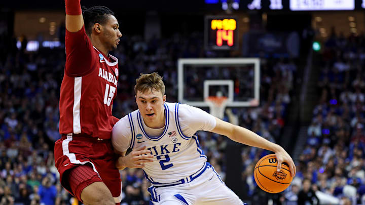 Duke Blue Devils forward Cooper Flagg drives to the basket against Alabama Crimson Tide forward Jarin Stevenson during the 2025 NCAA tournament