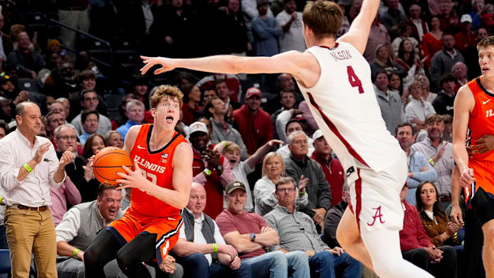 Nov 20, 2024; Birmingham, AL, USA; Illinois guard Kasparas Jakucionis (32) makes a face as he attempts a shot against Alabama forward Grant Nelson (4) in the CM Newton Classic at Legacy Arena. Alabama defeated Illinois 100-87. Mandatory Credit: Gary Cosby Jr.-Tuscaloosa News Nov 20, 2024; Birmingham, AL, USA; Illinois guard Kasparas Jakucionis (32) makes a face as he attempts a shot against Alabama forward Grant Nelson (4) in the CM Newton Classic at Legacy Arena. Alabama defeated Illinois 100-87. Mandatory Credit: Gary Cosby Jr.-Tuscaloosa News