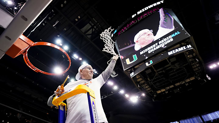 Mar 26, 2023; Kansas City, MO, USA; Miami (FL) head coach Jim Larranaga cuts down the net after defeating Texas in the Elite 8.