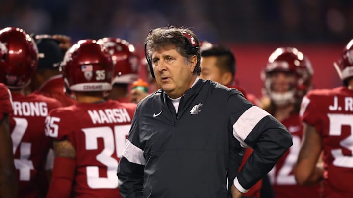 Dec 27, 2019; Phoenix, Arizona, USA; Washington State Cougars head coach Mike Leach reacts against the Air Force Falcons during the first half of the Cheez-It Bowl at Chase Field. Mandatory Credit: Mark J. Rebilas-Imagn Images
