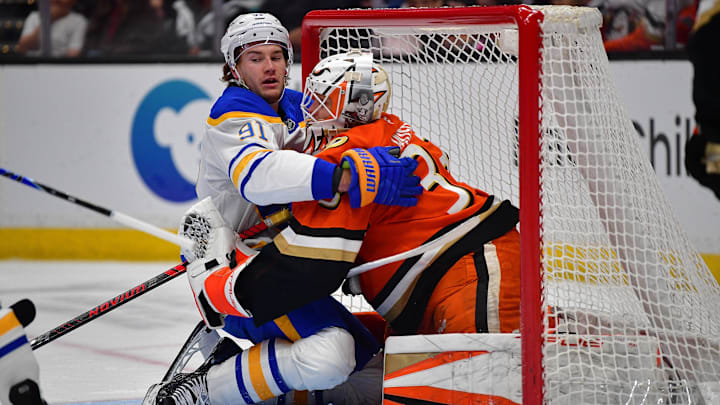 Mar 22, 2026; Anaheim, California, USA; Buffalo Sabres right wing Josh Doan (91) collides with Anaheim Ducks goaltender Ville Husso (33) during the first period at Honda Center. Mandatory Credit: Gary A. Vasquez-Imagn Images Mar 22, 2026; Anaheim, California, USA; Buffalo Sabres right wing Josh Doan (91) collides with Anaheim Ducks goaltender Ville Husso (33) during the first period at Honda Center. Mandatory Credit: Gary A. Vasquez-Imagn Images