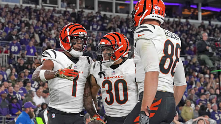 Nov 7, 2024; Baltimore, Maryland, USA; Cincinnati Bengals wide receiver Ja’Marr Chase (1) celebrates with running back Chase Brown (30) and tight end Mike Gesicki (88) following his fourth quarter touchdown catch against the Baltimore Ravens at M&T Bank Stadium. Mandatory Credit: Mitch Stringer-Imagn Images