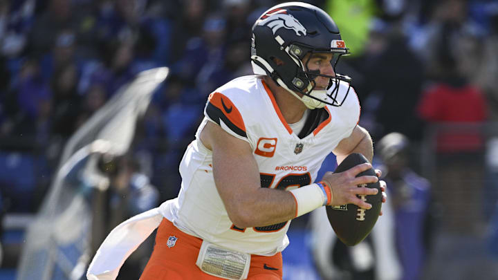 Nov 3, 2024; Baltimore, Maryland, USA; Denver Broncos quarterback Bo Nix (10) runs during the first half against the Baltimore Ravens at M&T Bank Stadium. 