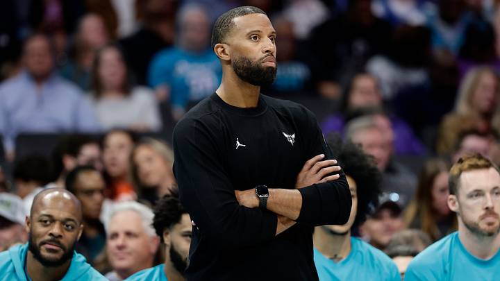 Mar 19, 2026; Charlotte, North Carolina, USA; Charlotte Hornets Head Coach Charles Lee watches from the sideline during the third quarter against the Orlando Magic at Spectrum Center. Mandatory Credit: Brian Westerholt-Imagn Images Mar 19, 2026; Charlotte, North Carolina, USA; Charlotte Hornets Head Coach Charles Lee watches from the sideline during the third quarter against the Orlando Magic at Spectrum Center. Mandatory Credit: Brian Westerholt-Imagn Images