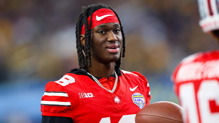 Dec 29, 2023; Arlington, TX, USA;  Ohio State Buckeyes wide receiver Marvin Harrison Jr. (18) looks