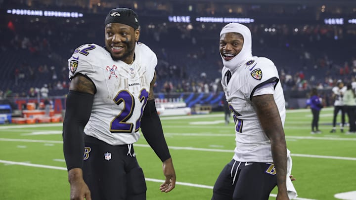 Dec 25, 2024; Houston, Texas, USA;  Baltimore Ravens running back Derrick Henry (22) and quarterback Lamar Jackson (8) smile after the game against the Houston Texans at NRG Stadium. Mandatory Credit: Troy Taormina-Imagn Images