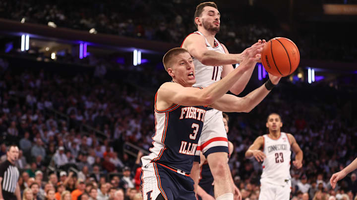 Nov 28, 2025; New York, New York, USA;  Illinois Fighting Illini forward Ben Humrichous (3) and UConn Huskies forward Alex Karaban (11) fight for a rebound in the first half at Madison Square Garden. Mandatory Credit: Wendell Cruz-Imagn Images