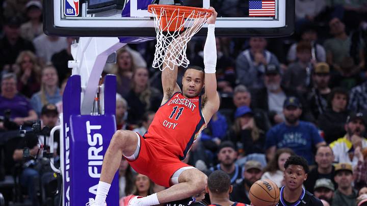 Feb 26, 2026; Salt Lake City, Utah, USA; New Orleans Pelicans guard Bryce McGowens (11) hangs on the rim after a dunk against the Utah Jazz during the second half at Delta Center. Mandatory Credit: Rob Gray-Imagn Images Feb 26, 2026; Salt Lake City, Utah, USA; New Orleans Pelicans guard Bryce McGowens (11) hangs on the rim after a dunk against the Utah Jazz during the second half at Delta Center. Mandatory Credit: Rob Gray-Imagn Images