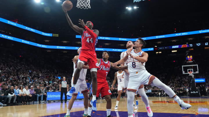 Mar 20, 2024; Phoenix, Arizona, USA; Philadelphia 76ers forward Paul Reed (44) puts up a layup against the Phoenix Suns during the second half at Footprint Center. Mandatory Credit: Joe Camporeale-USA TODAY Sports