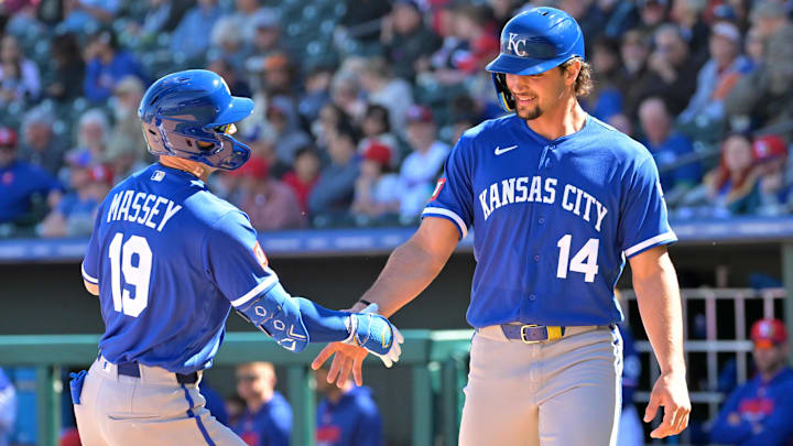 Feb 20, 2026; Surprise, Arizona, USA;  Kansas City Royals right fielder Jac Caglianone (14) scored on a two-run home run by second baseman Michael Massey (19) in the second inning against the Texas Rangers at Surprise Stadium. Mandatory Credit: Jayne Kamin-Oncea-Imagn Images