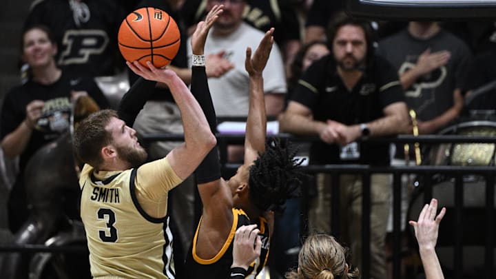 Purdue Boilermakers guard Braden Smith (3) shoots the ball over Toledo Rockets guard Bryce Ford (2) 