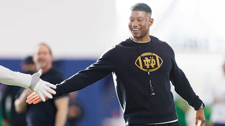 Notre Dame head coach Marcus Freeman greets his players during a Notre Dame football spring practice at Irish Athletic Center on Wednesday, March 19, 2025, in South Bend.