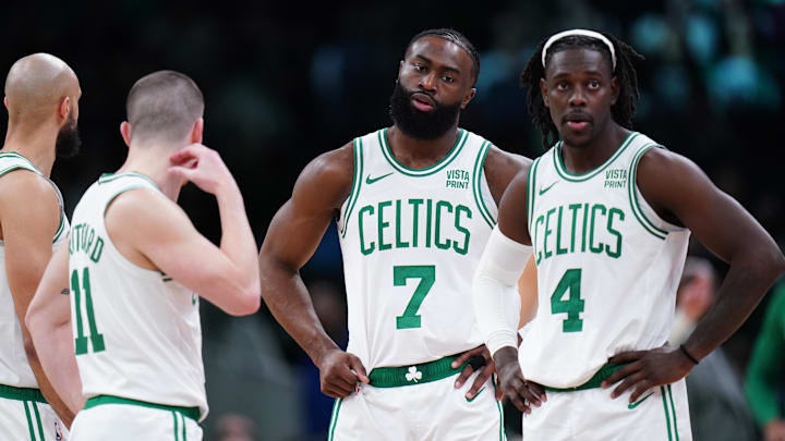 Feb 1, 2024; Boston, Massachusetts, USA: Boston Celtics guard Jrue Holiday (4), guard Jaylen Brown (7), guard Payton Pritchard (11) and guard Derrick White (9) on the court against the Los Angeles Lakers in the second half at TD Garden. Mandatory Credit: David Butler II-Imagn Images